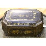 A mid to late Victorian, black lacquered chinoserie sewing work box, raised on carved feet with
