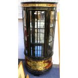 A 20th Century Empire style ebonised bow-front form display cabinet, interior fitted with