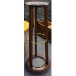 A late Victorian cylindrical mahogany and tubular brass stick stand with metal drip tray, 132cm