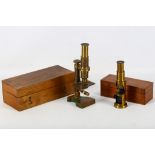 Two Victorian/Edwardian cased lacquered brass microscopes