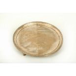 WITHDRAWN - A late Victorian circular silver card tray, Daniel and John Wellby, London 1899, with