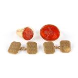 A small group of jewellery, comprising two intaglio rings and a pair of 9ct gold cufflinks, UK