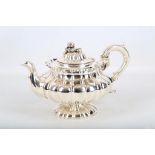 A William IV antique sterling silver teapot, London 1833 by John Edward Terry of compressed circular