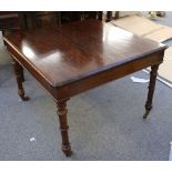 A George III style mahogany library bookcase, the pierced rosette carved cornice with key blind