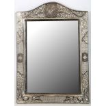 A large Iranian white metal framed mirror, maker's mark Mohammed Ali of Isfahan, engraved with