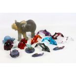 A collection of Daum crystal glass objects, to include six dolphins of various colours, two fish,