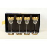 St. Louis France, a set of four 20th century boxed gilded wine glasses, bearing maker's labels, (