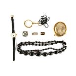 A collection of jewellery, Including a faceted jet bead necklace, a pair of lorgnettes, a Scottish