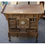 A late 19th / early 20th Century, Chinese Huanghali style hardwood cabinet on stand, having two side