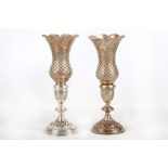 A pair of 1940's Iranian Persian white metal pierced candlesticks, with storm shades, maker's mark