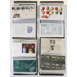 Collection of FDC, pres. packs, phq cards in 4 folders