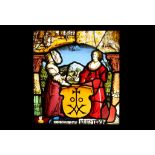 A 17TH CENTURY SWISS STAINED GLASS WINDOW DEPICTING TWO NOBLEWOMEN of rectangular leaded form,