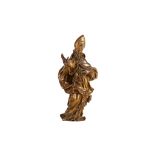 A 17th CENTURY GERMAN BAROQUE LIMEWOOD AND GILDED FIGURE OF A BISHOP the bearded figure wearing a