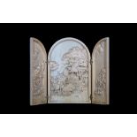 A 19TH CENTURY DIEPPE IVORY RELIEF CARVED TRIPTYCH DEPICTING A BATTLE AT SEA the arched panels