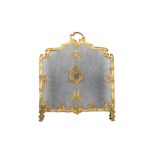 A 19TH CENTURY FRENCH GILT BRONZE FIRESCREEN IN THE LOUIS XV STYLE the frame of scrolling form,