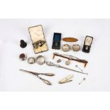 A mixed group of antique sterling silver sewing items  including seven thimbles, one miniature,