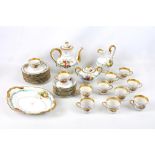Early 20th century French porcelain 32 piece part tea service, transfer printed with fruit bunches.