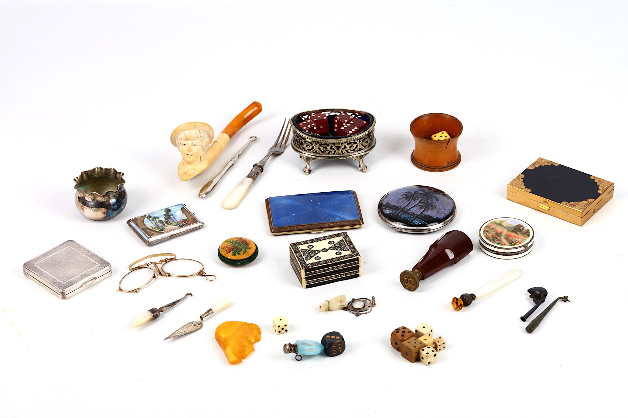 A collection of small cigarette cases, compacts, lorgnette, salt, carved amber, Meerscham pipe, dice