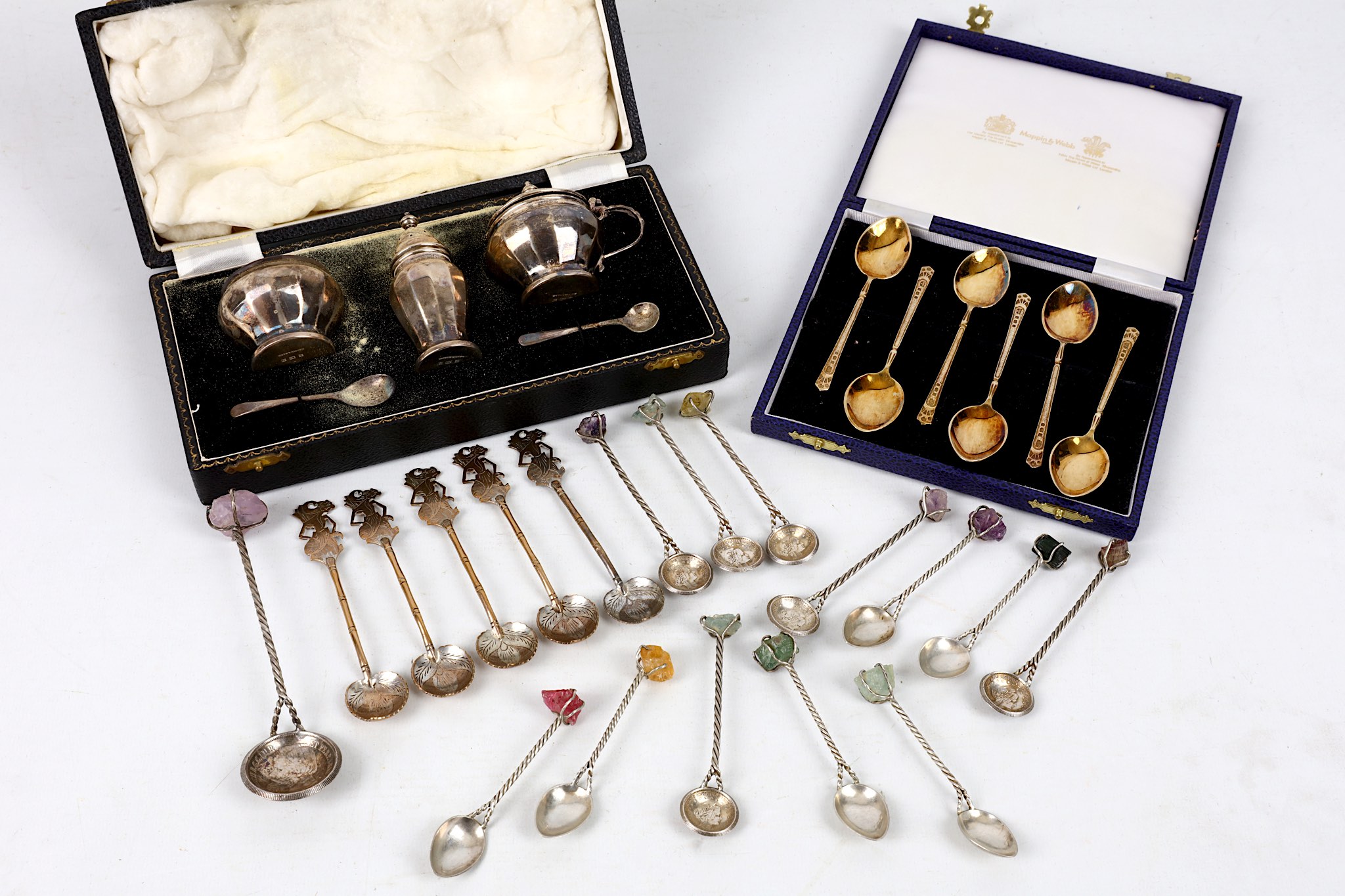 Cased mid 20th century Mappin and Webb silver three piece cruet, a cased set of six Mappin and
