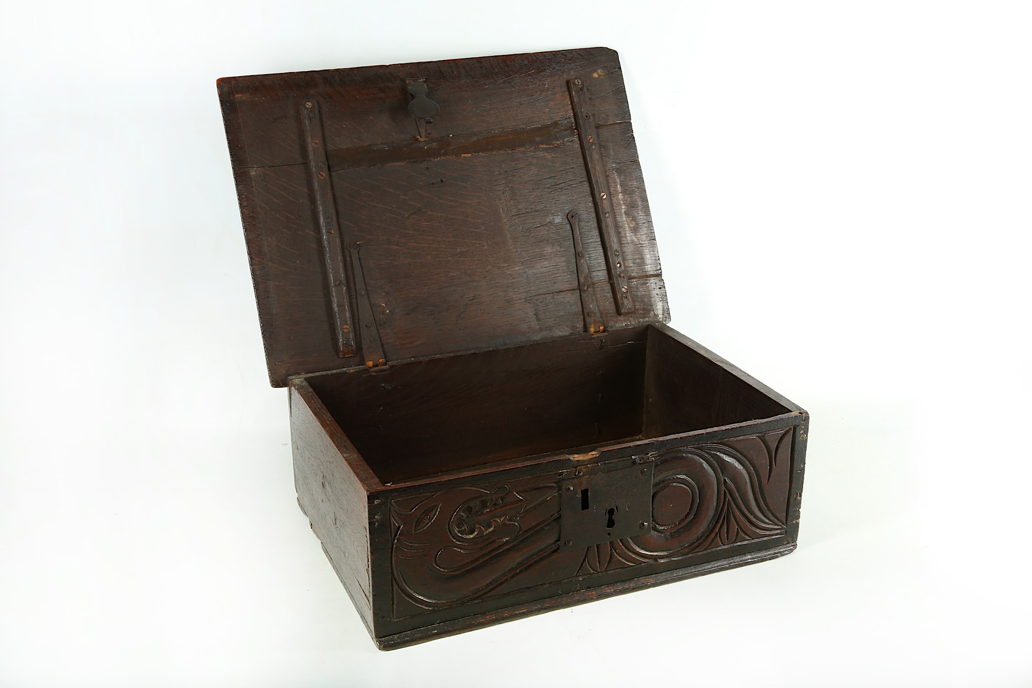 A 17th Century oak bible box, the front panel carved with a coiled dragon. - Image 2 of 5