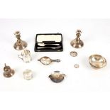 A mixed group of sterling silver items, including a modern pair of desk / dwarf candlesticks,