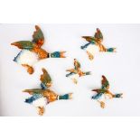 A set of five Beswick pottery graduated duck wall plaques, numbered 5960, introduced 1938, withdrawn