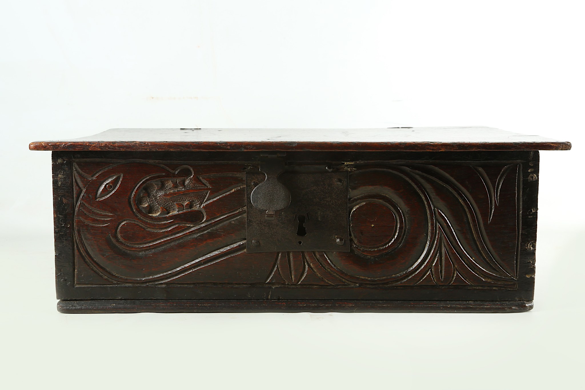 A 17th Century oak bible box, the front panel carved with a coiled dragon. - Image 5 of 5