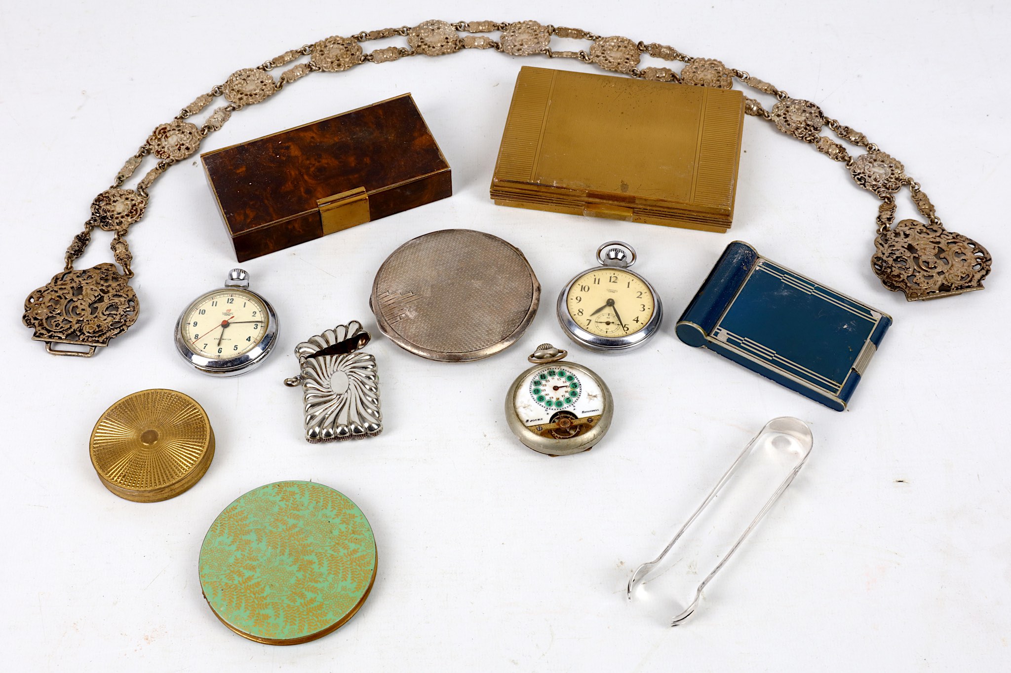 Art Deco engine turned circular silver compact, five further later compacts, three fob watches,