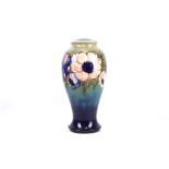 A mid 20th Century Moorcroft pottery baluster shaped original lamp base, tube-lined in 'Anemone'