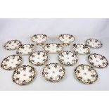 An Edwardian Coalport part dessert service, comprising 12 plates and 5 shaped dishes with pierced