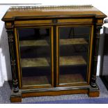 A late Victorian aesthetic movement ebonised, amboyna side cabinet by Gillows & Co., the brass