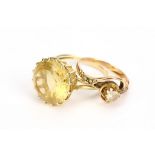 A citrine ring and a white sapphire ring (2)