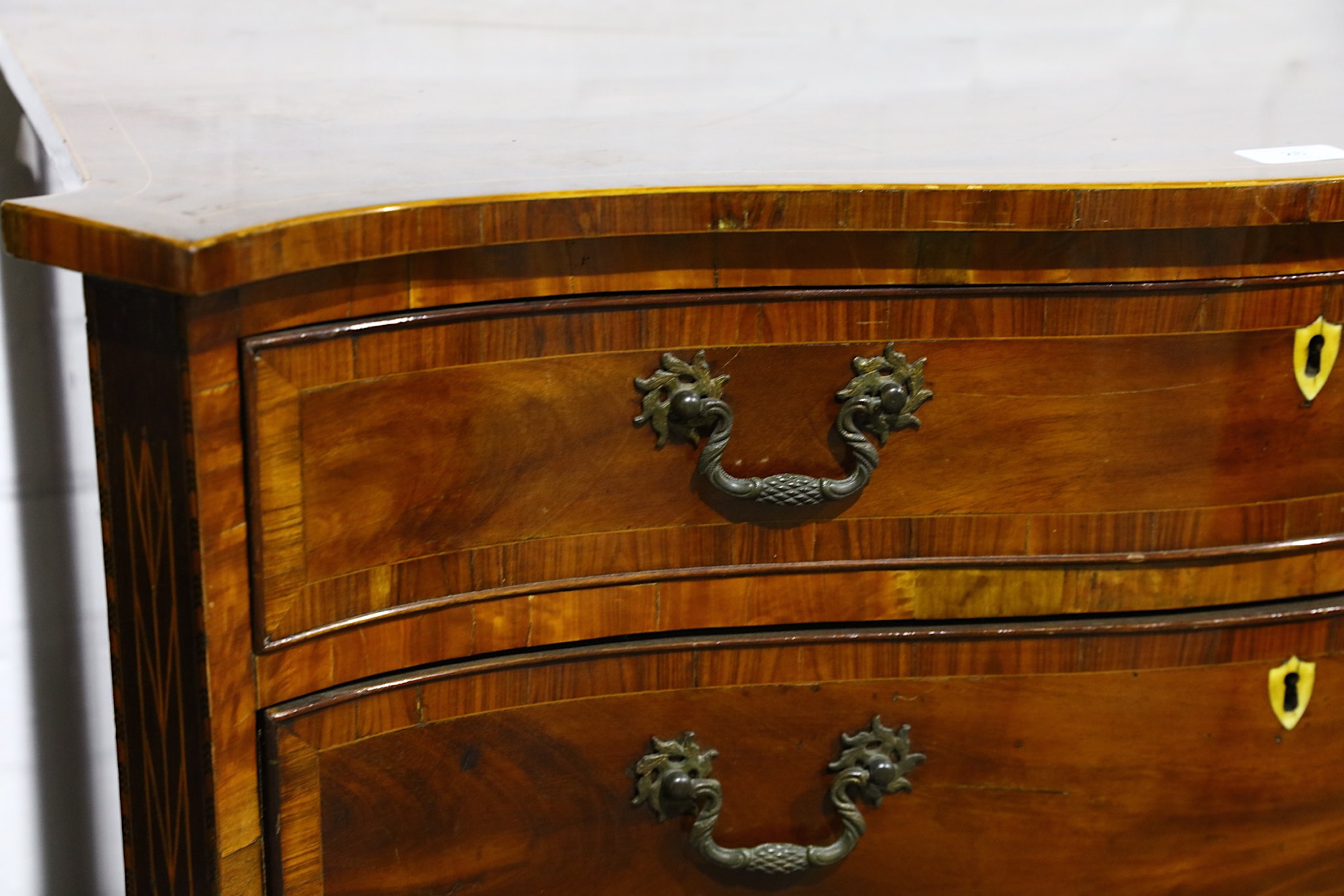 A small George III crossbanded and boxwood strung mahogany serpentine chest, fitted 4 drawers on - Image 2 of 3