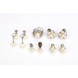 A group of cultured pearl jewellery, comprising a ring, three pairs of earrings, a single earring, a