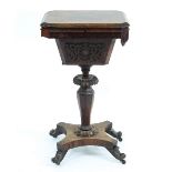 A Victorian rosewood work table,