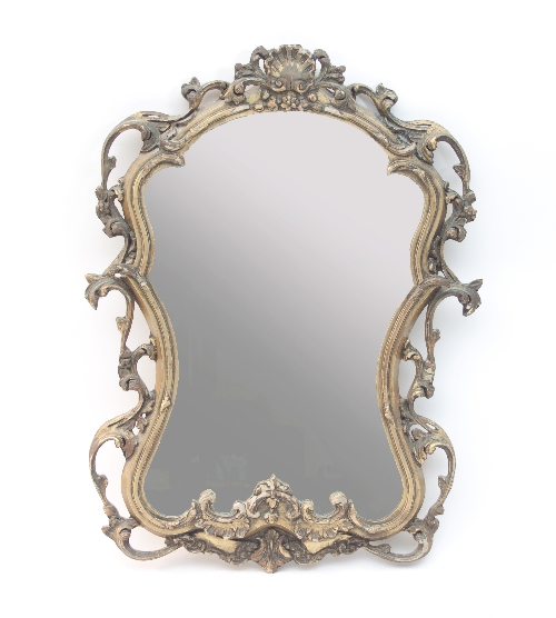 A shaped gilt wall mirror with scroll and shell surmount,