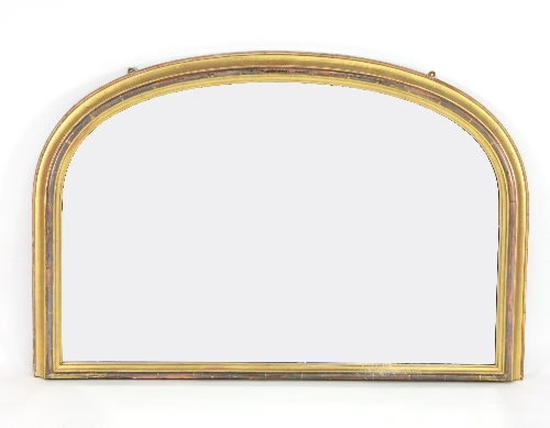 A Victorian arch top overmantel mirror with moulded frame,