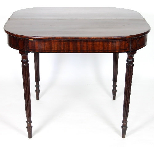 A Regency mahogany D-shaped tea table on reeded tapering legs, - Image 2 of 2