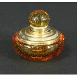 A Whitefriars controlled bubble amber glass inkwell, of squat circular form with brass mounts,