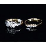 A diamond five-stone ring set to an 18ct gold band,