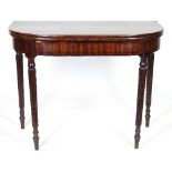 A Regency mahogany D-shaped tea table on reeded tapering legs,