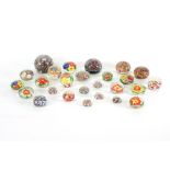 A large group of mostly Chinese glass paperweights,