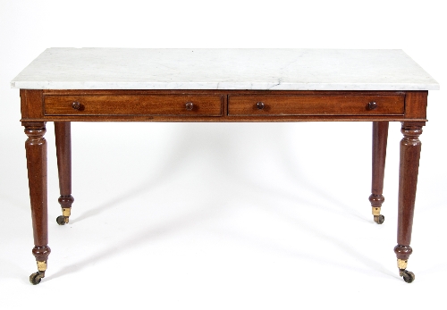 A late 19th Century mahogany rectangular table with marble top,