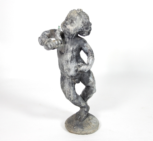 A lead fountainhead figure of a putto with serpent entwined around his arm,