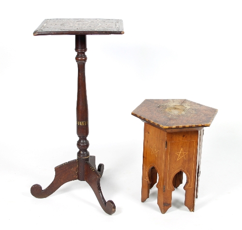 A 19th Century mahogany square table with inlaid top on a turned column and tripod support,