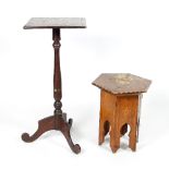 A 19th Century mahogany square table with inlaid top on a turned column and tripod support,