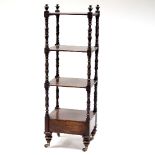 A George III mahogany four-tier whatnot on baluster and ring turned supports,