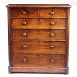 A large Victorian mahogany chest of two short and four long drawers, on a plinth,