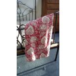 Four pairs of floral curtains decorated with stylised flowerheads in cream to a red ground,