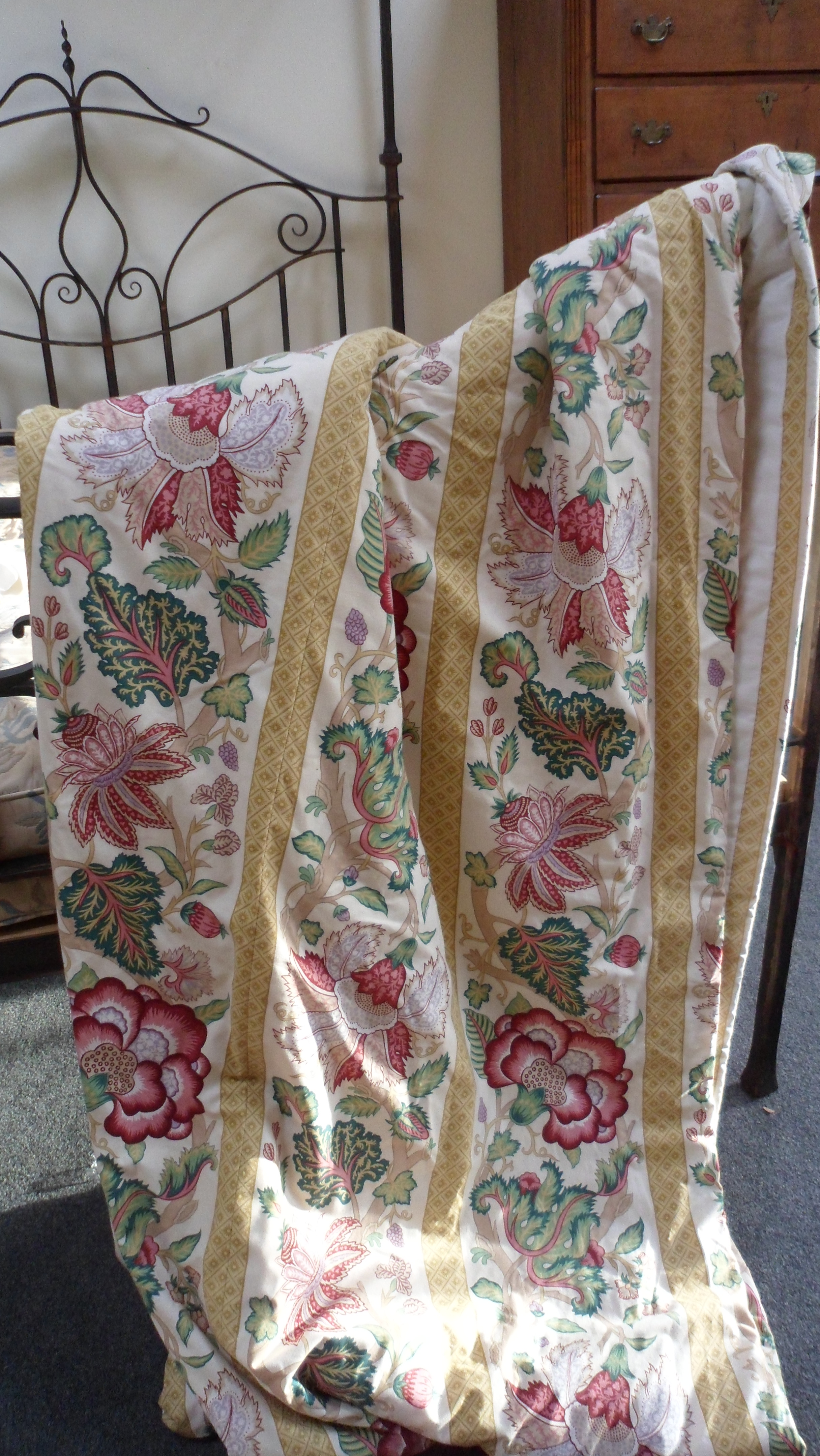 Three pairs of floral and stripe printed curtains, in yellow, reds and green, 230cm drop x 80cm,